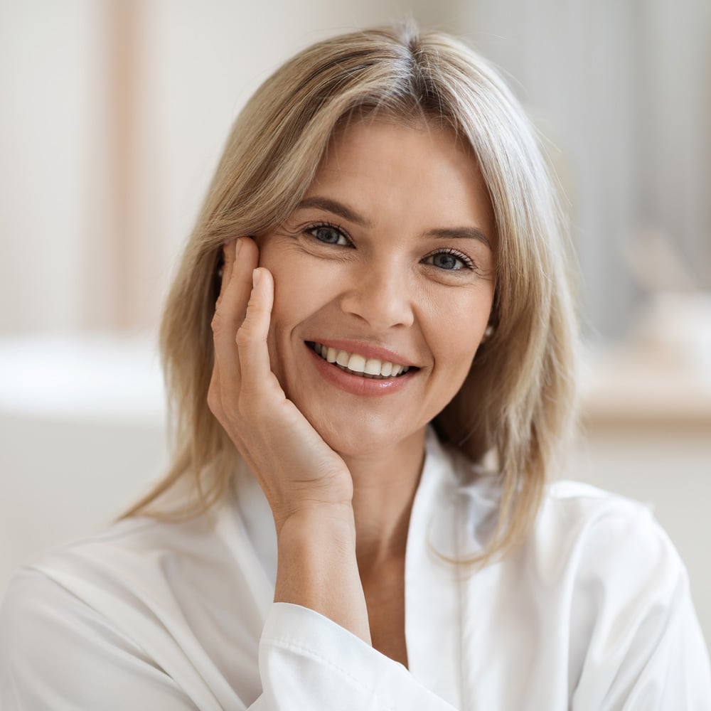 a woman wearing a white shirt